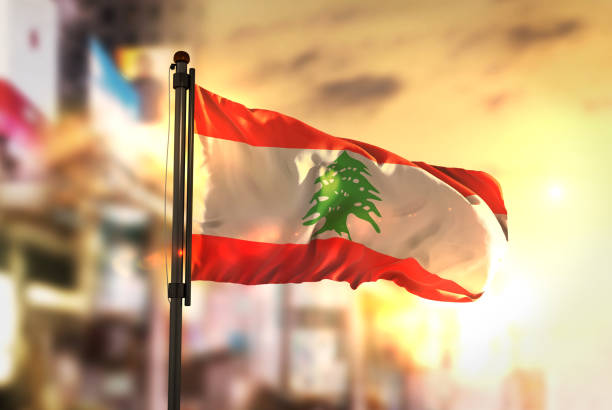 Lebanon Flag Against City Blurred Background At Sunrise Backlight Λίβανος και ΔΝΤ